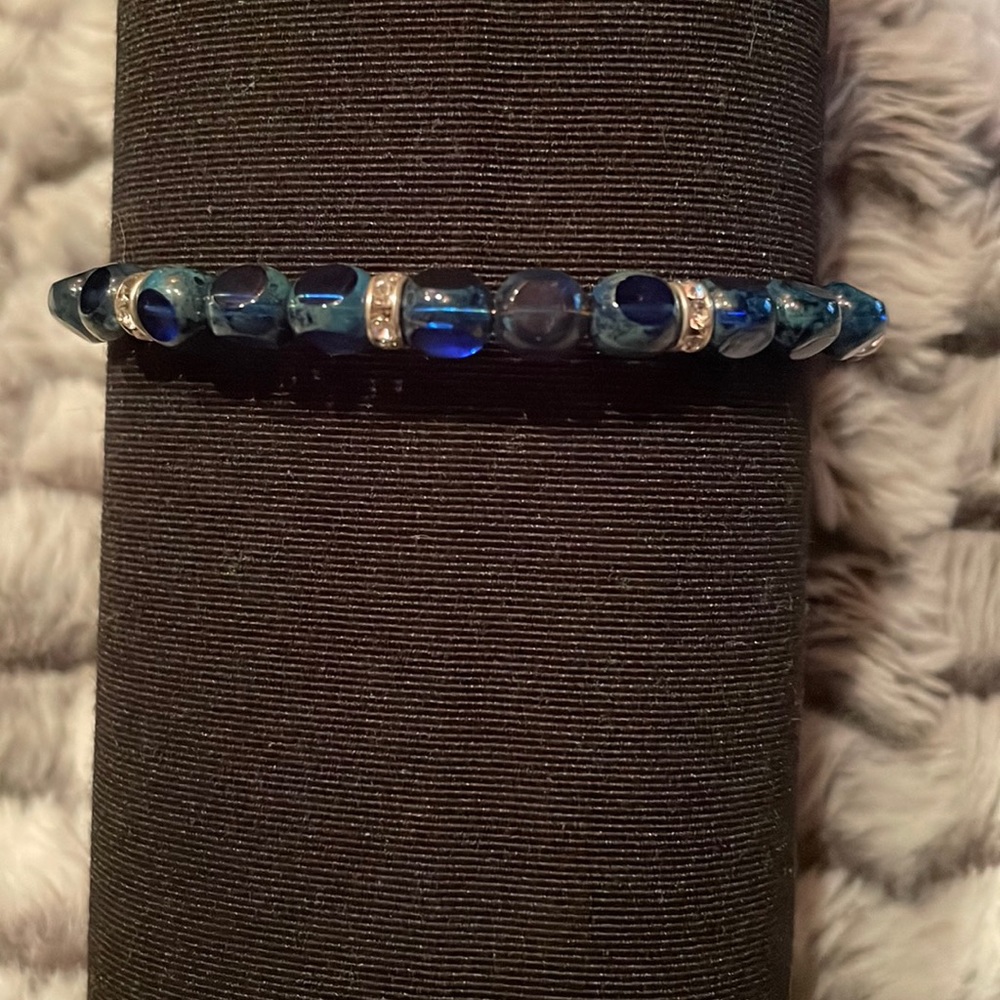 Barely worn Alex and Ani +Energy series adjustable bracelet. Blue and silver